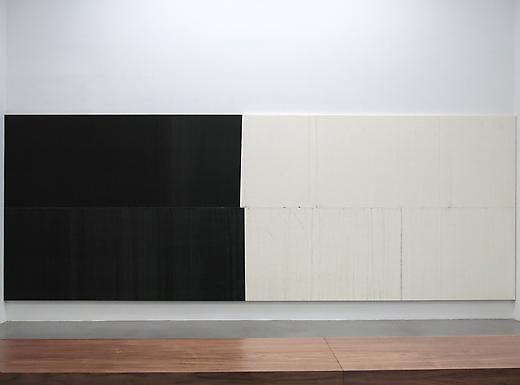 Wade Guyton painting in a gallery